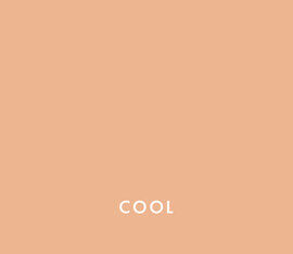 A simple, solid light peach background with the word "COOL" in white text at the bottom.