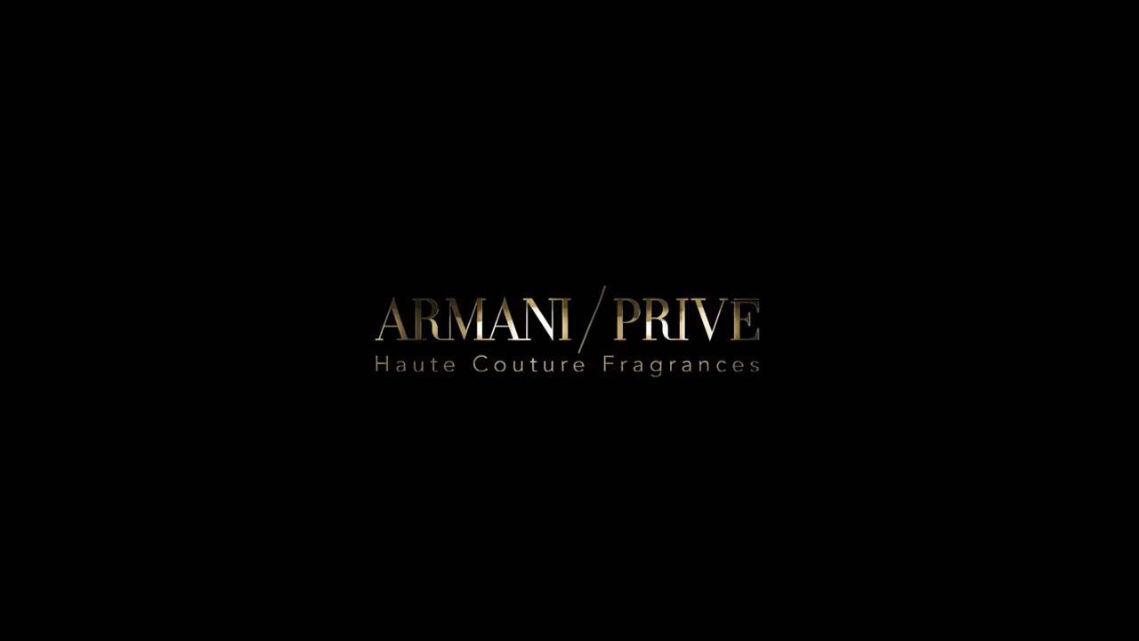 Logo of Armani Prive, featuring the text "ARMANI/PRIVE" and "Haute Couture Fragrances," set against a black background.