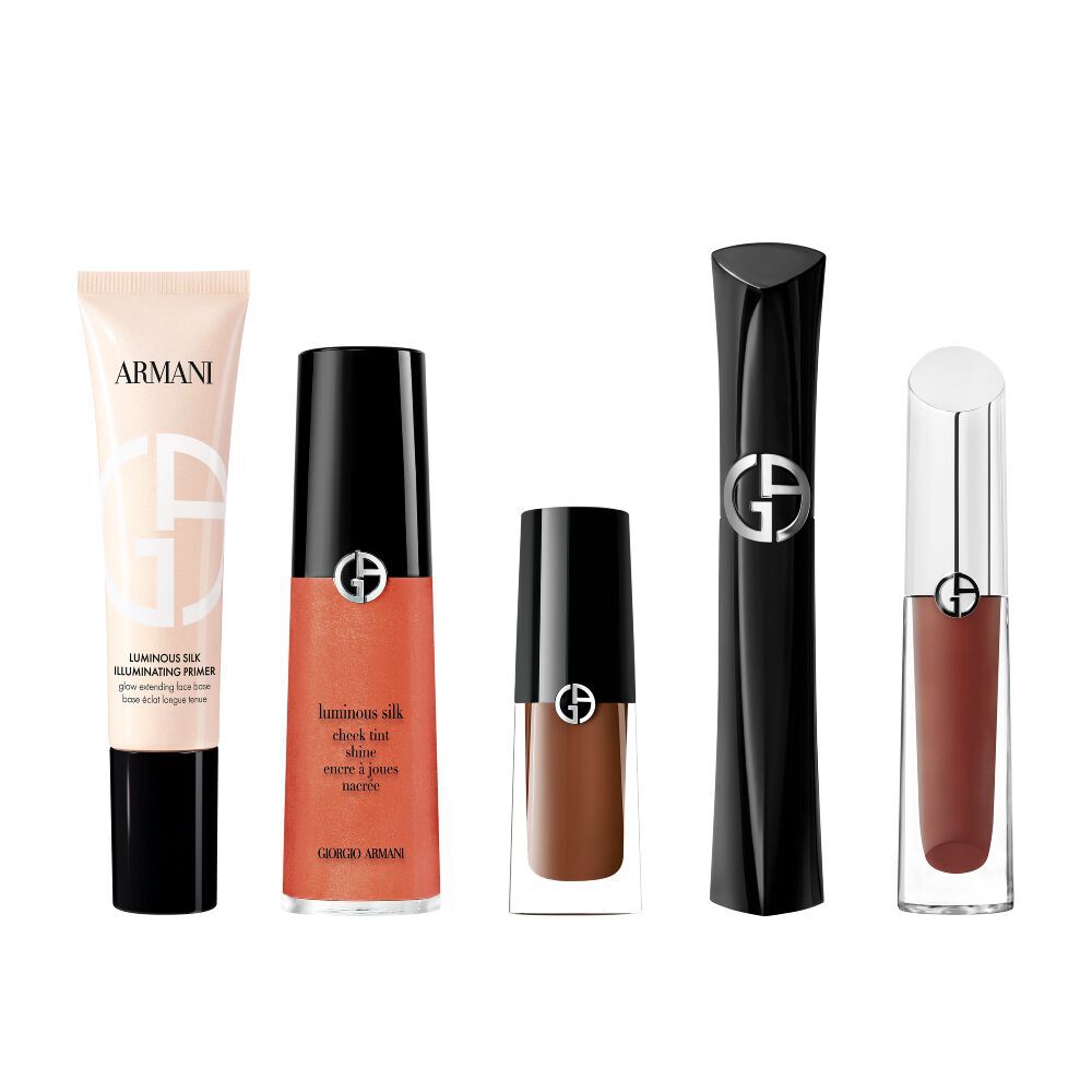 A selection of Giorgio Armani beauty products, including Luminous Silk Primer and Cheek Tint, curated to create a glowing, sunkissed summer makeup look.